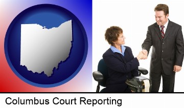 a court reporter shaking hands with an attorney in Columbus, OH